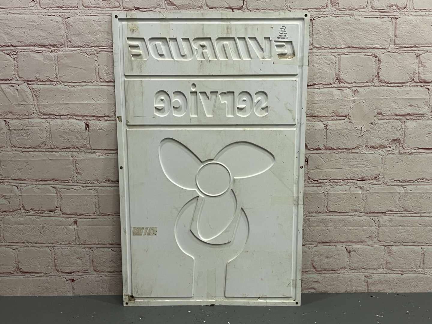<p>Evinrude Service Pressed Plastic Sign</p>