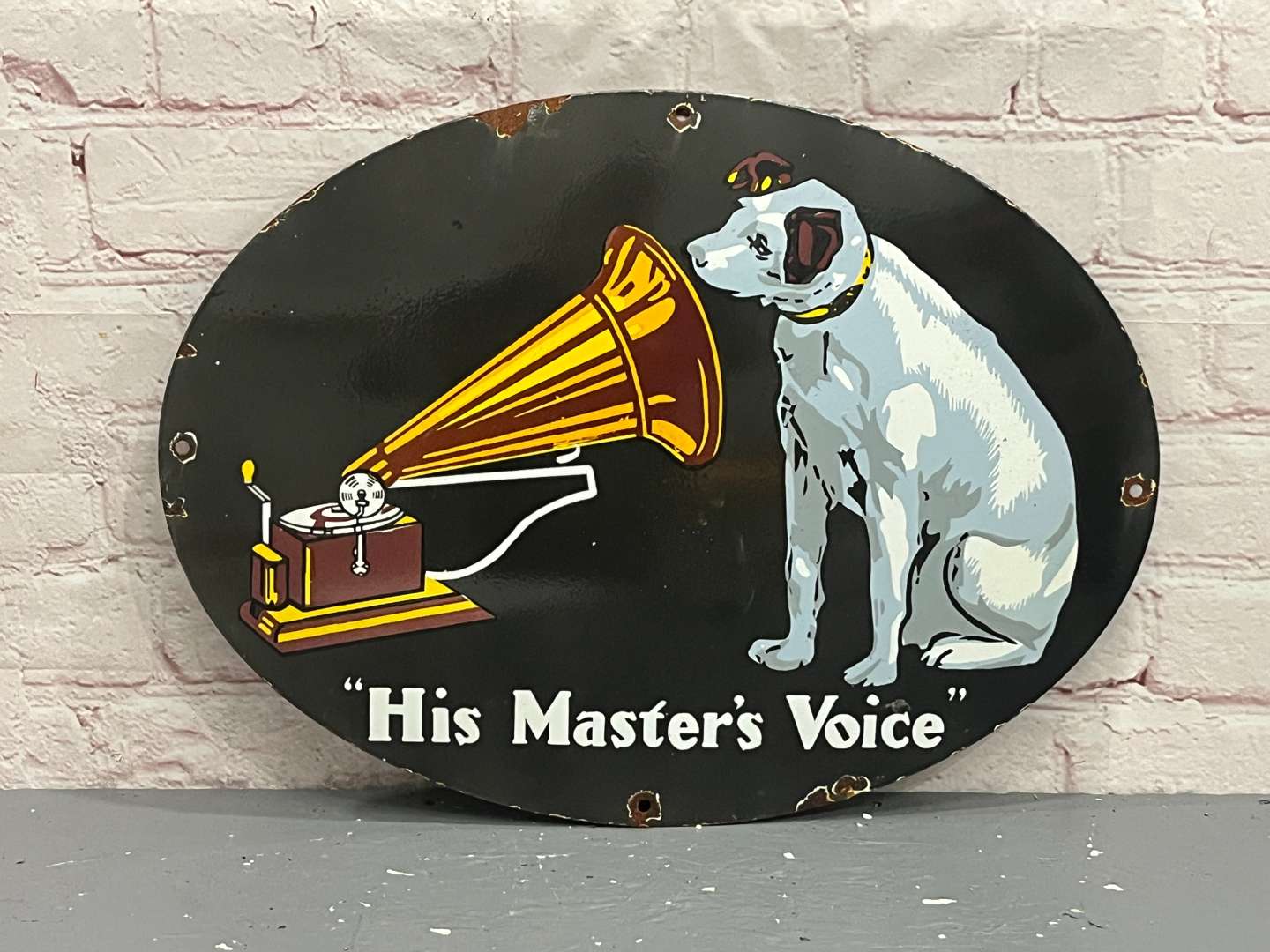 <p>HMV “His Master Voice” Oval Enamel Sign</p>