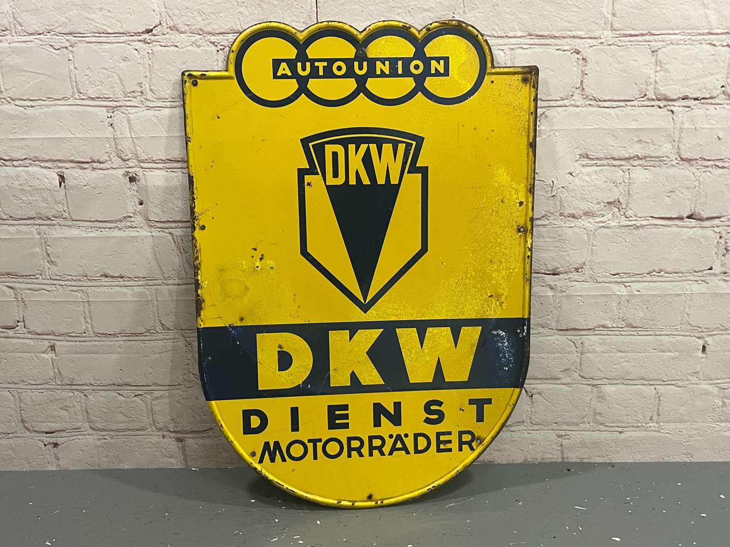 <p>DKW Autounion Pressed Tin Sign</p>