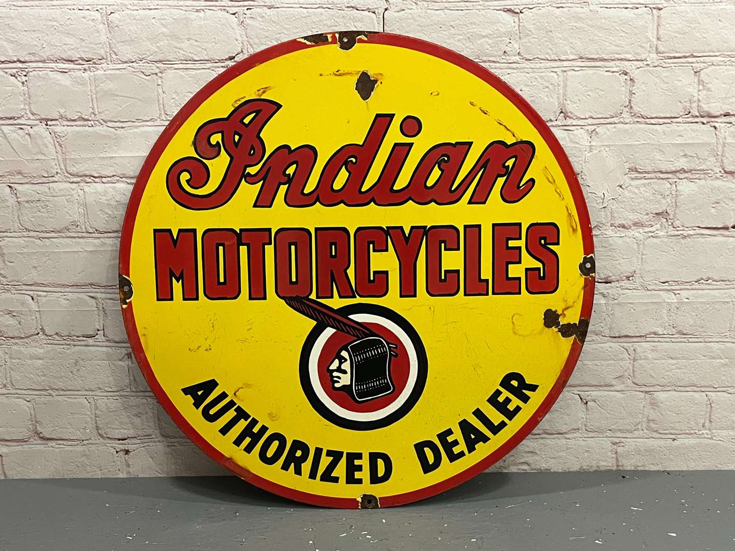 <p>Indian Motorcycles Authorized Dealer Circular Enamel Sign</p>