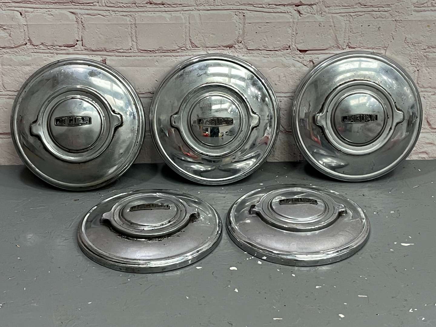 <p>Five Jaguar XK120 Hub Caps</p>
