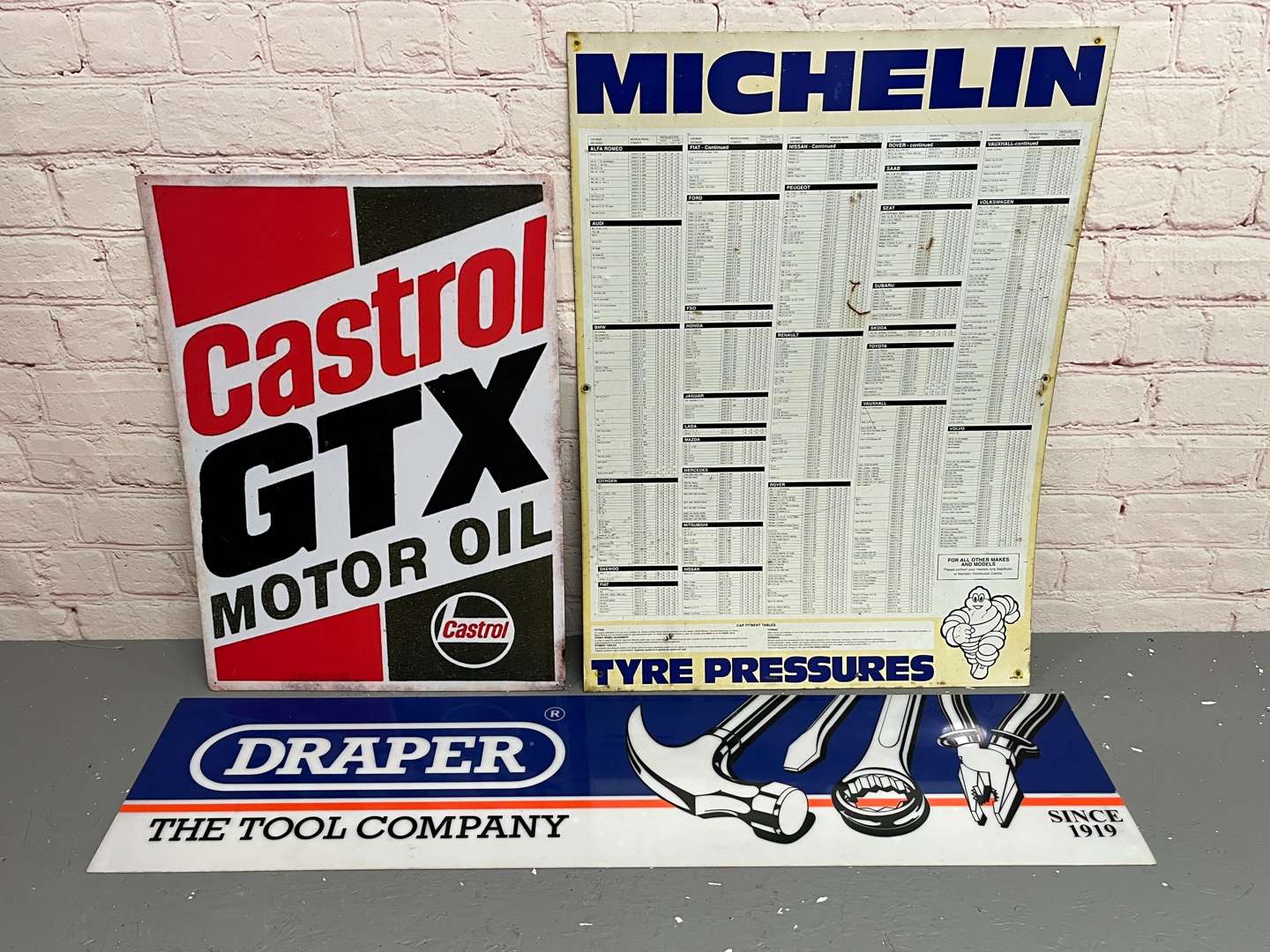 <p>Michelin Tyre Pressure Chart, Castrol GTX Sign & Perspex Draper Sign (3)</p>