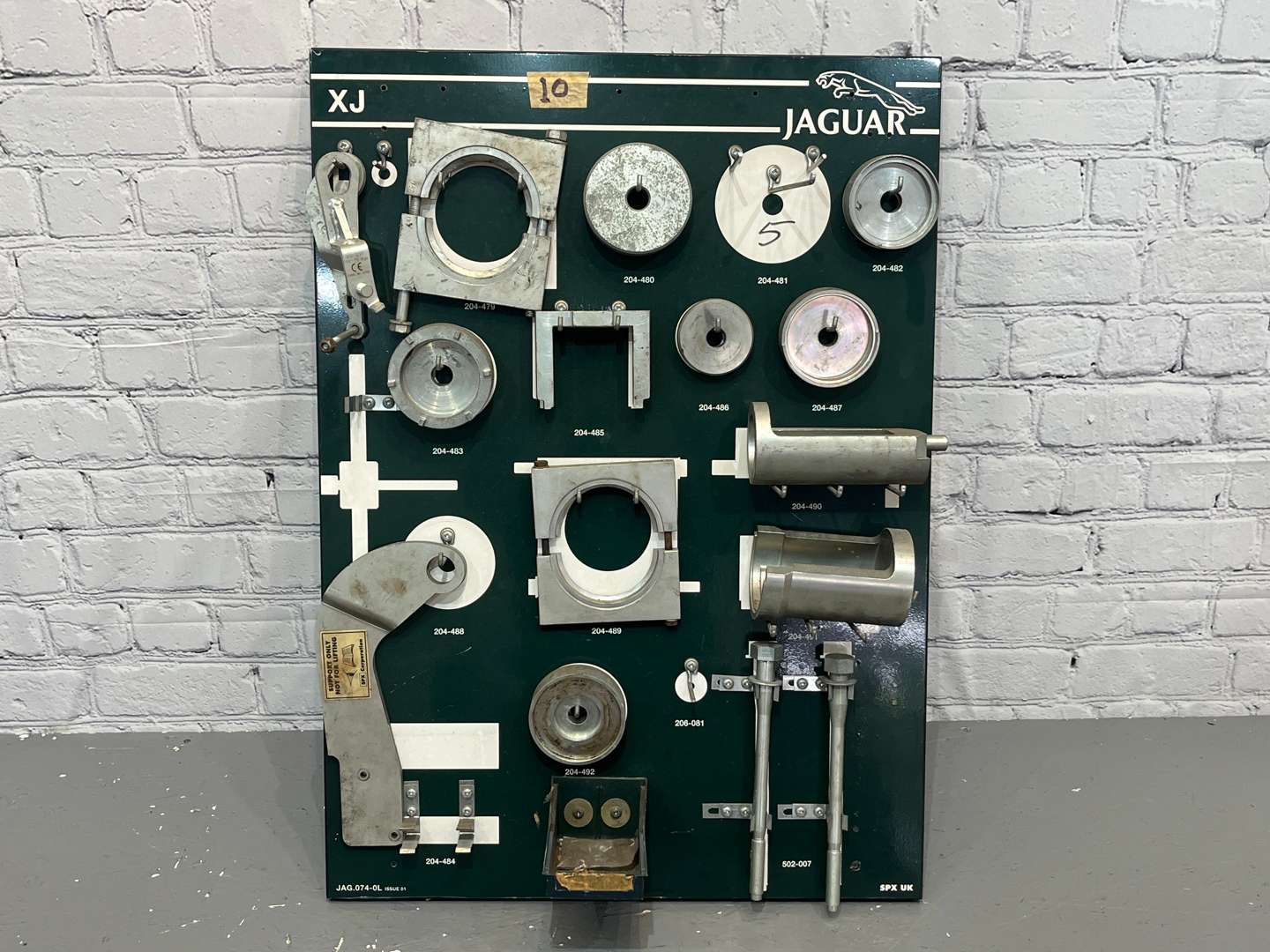 <p>Jaguar XJ Tool Board and Tools</p>