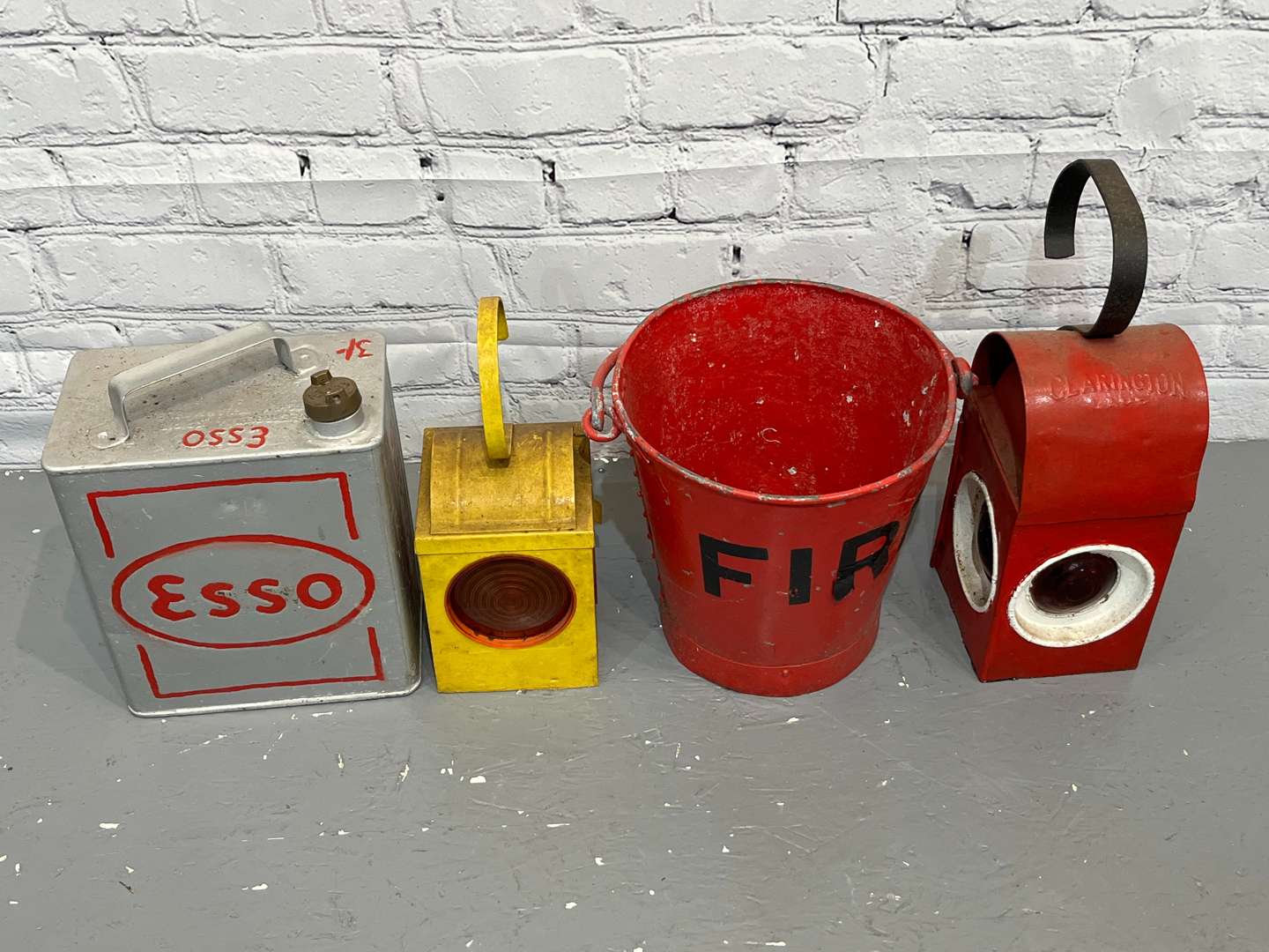 <p>Two Road Work Lamps, Esso Two Gallon Fuel Can & Fire Bucket (4)</p>
