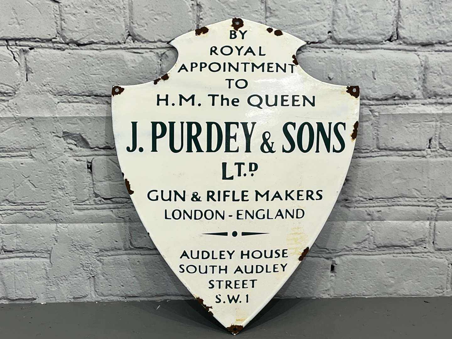 <p>Purdey & Sons Ltd Gun and Rifle Makers Shield Enamel Sign</p>