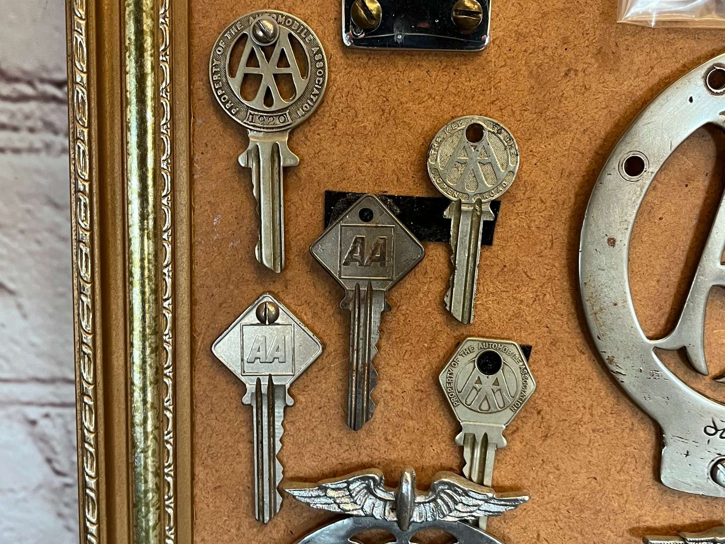 <p>Ten Framed AA Badges, To Include Stenson Cooke Etc</p>