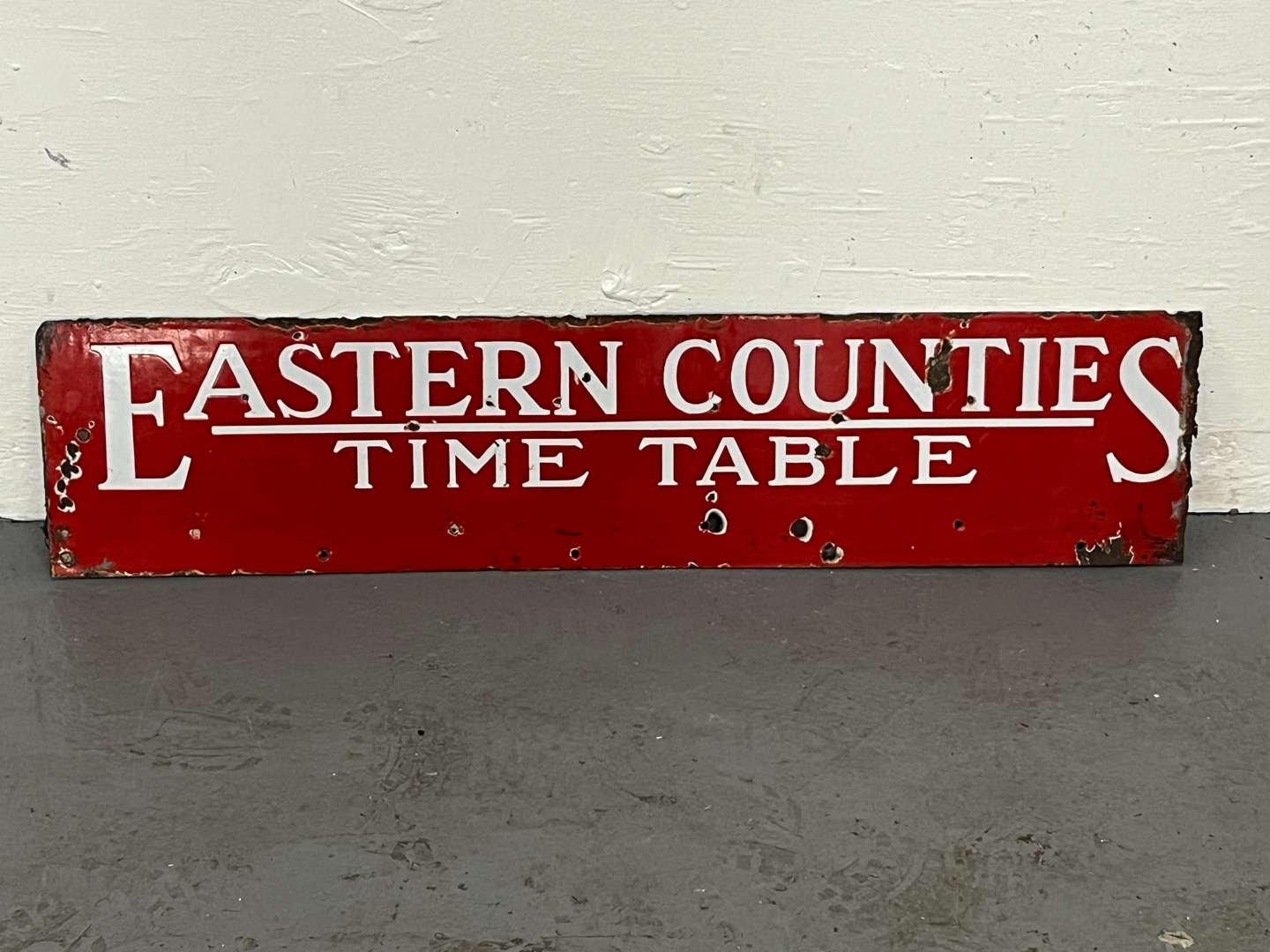 <p>Eastern Counties Time Table Enamel Sign</p>