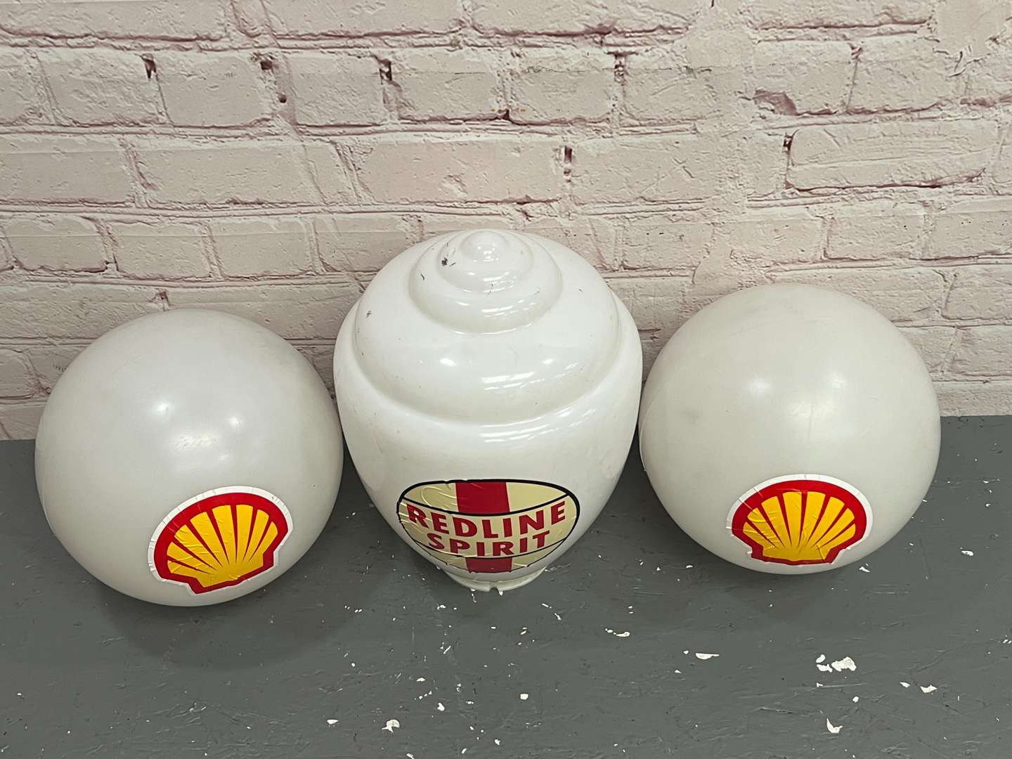 <p>Three Plastic Globes With Stickered Livery&nbsp;</p>