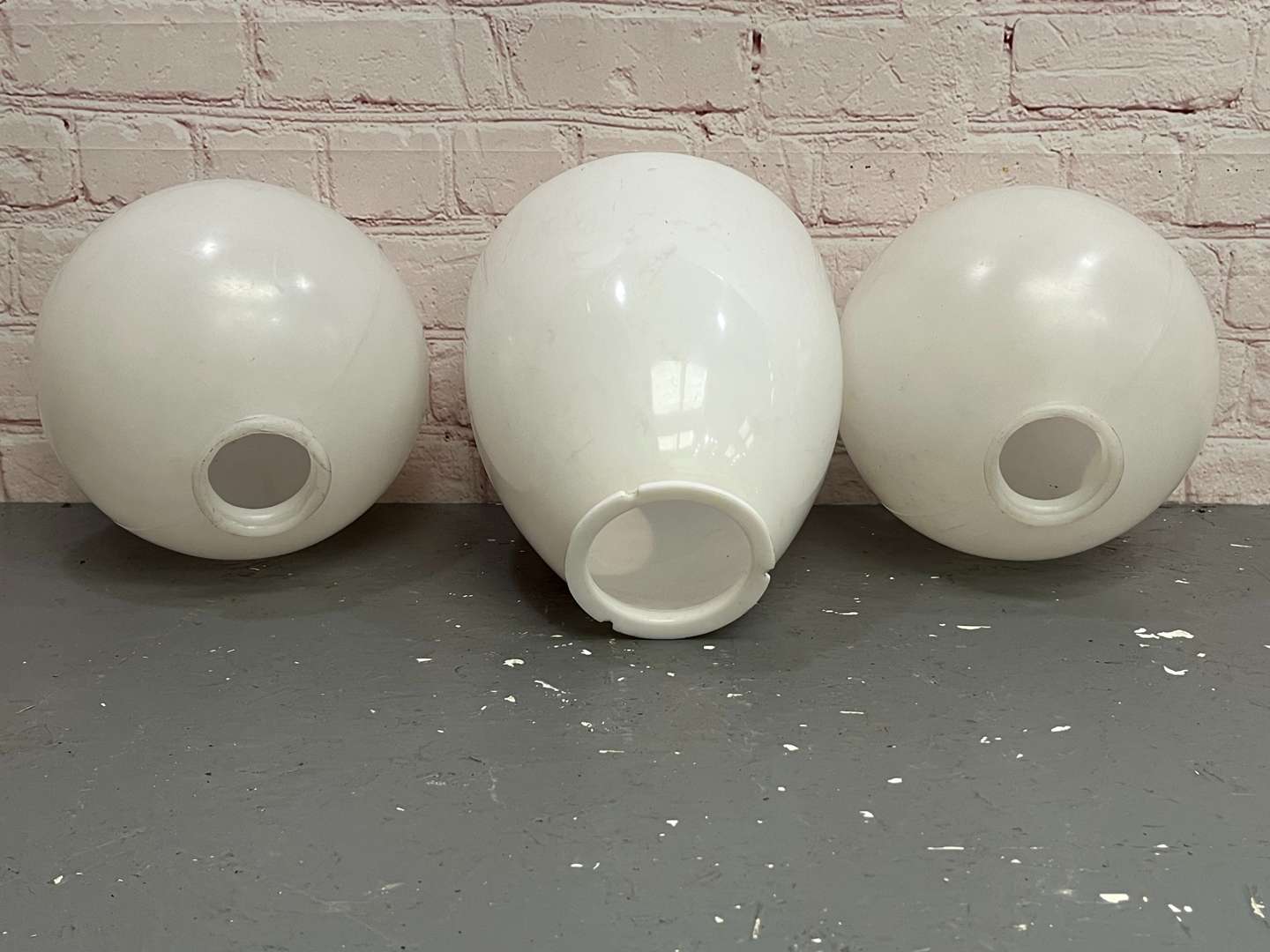 <p>Three Plastic Globes With Stickered Livery&nbsp;</p>