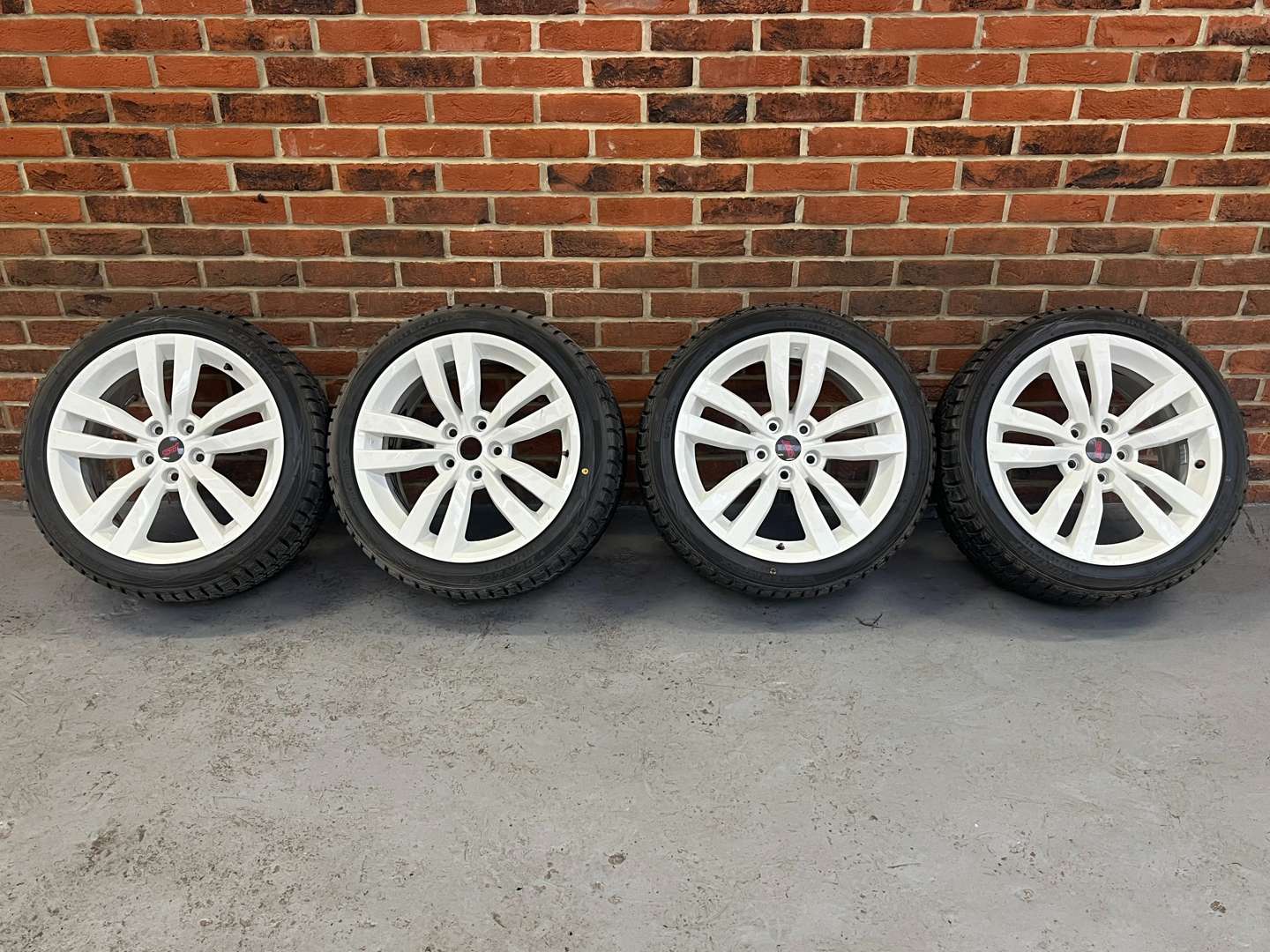 <p>Set of Four White STi Alloy Multi Spoked Wheels</p>