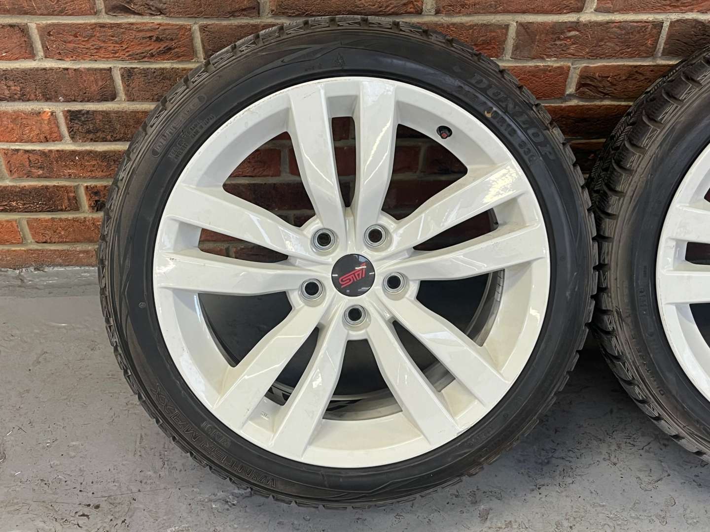 <p>Set of Four White STi Alloy Multi Spoked Wheels</p>