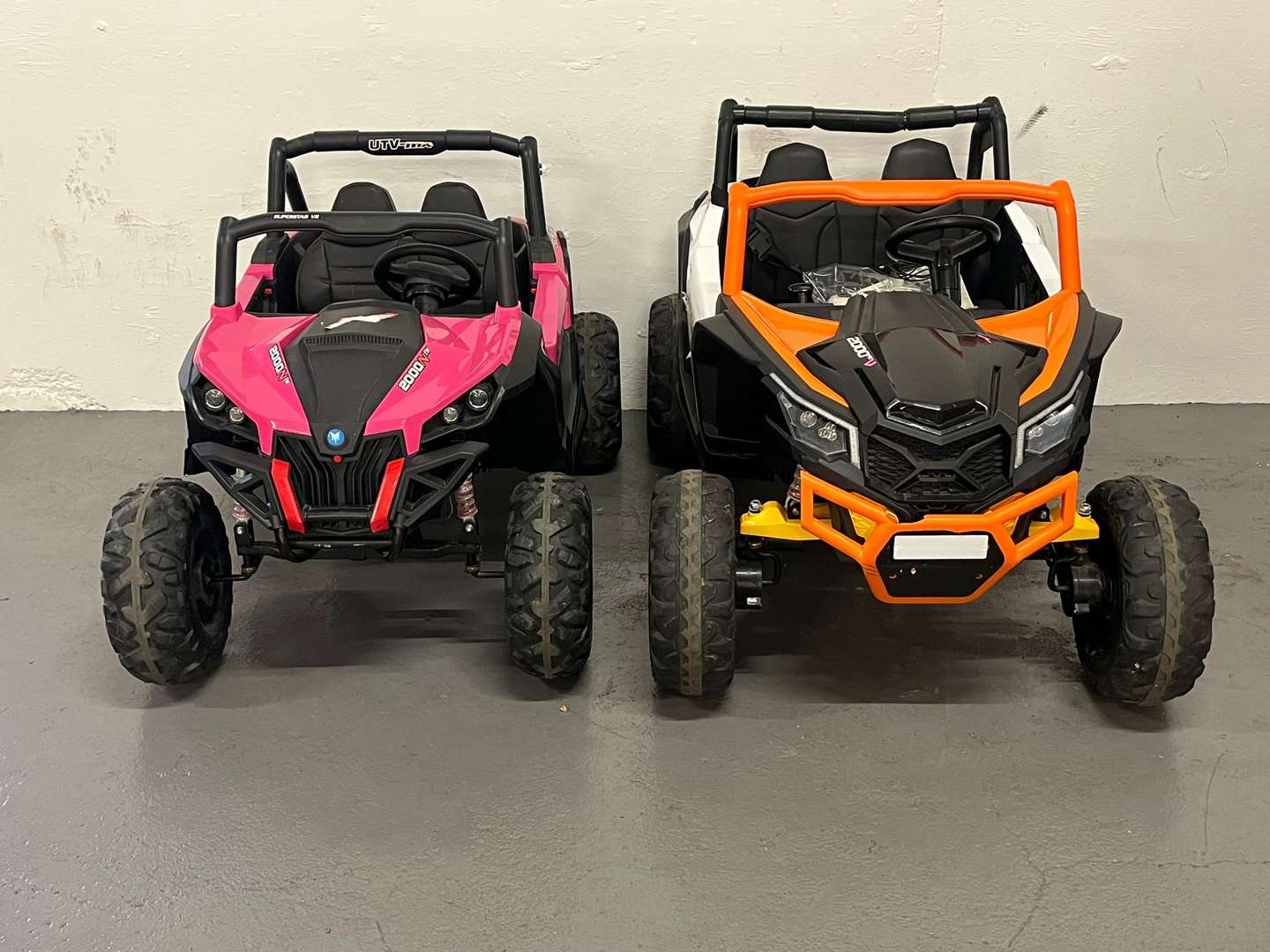 <p>Two Battery Operated Children's Cars</p>