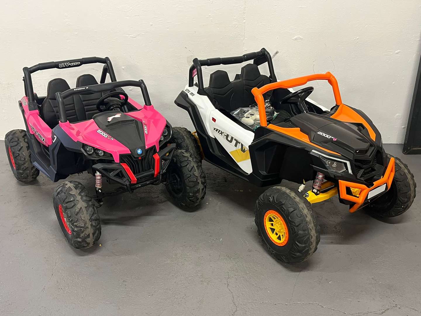 <p>Two Battery Operated Children's Cars</p>