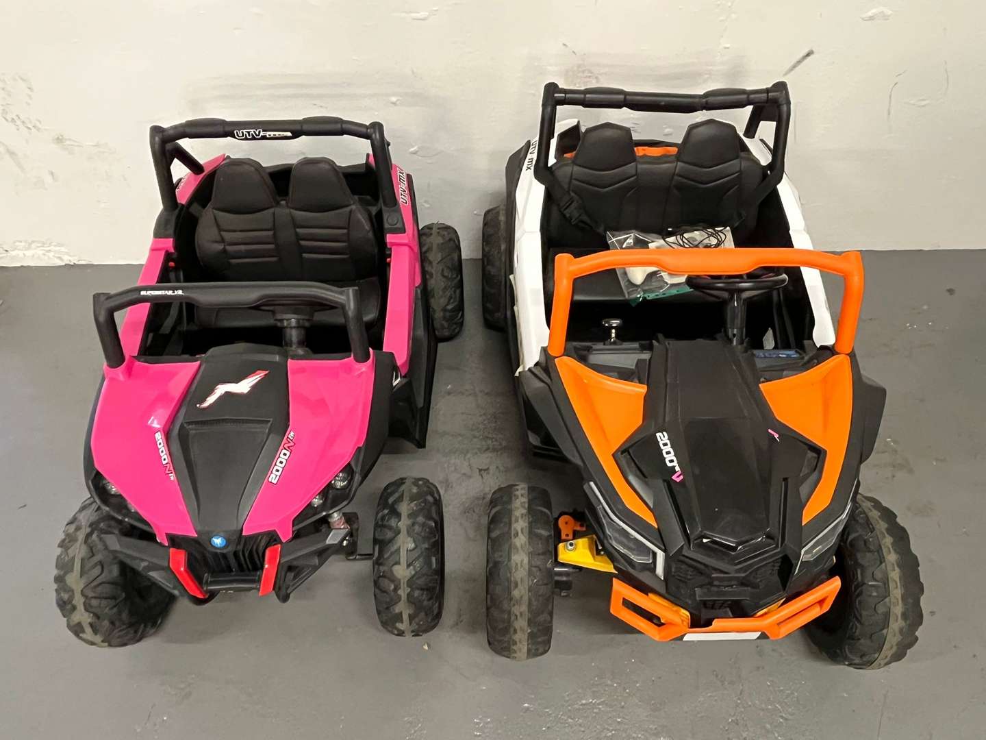 <p>Two Battery Operated Children's Cars</p>