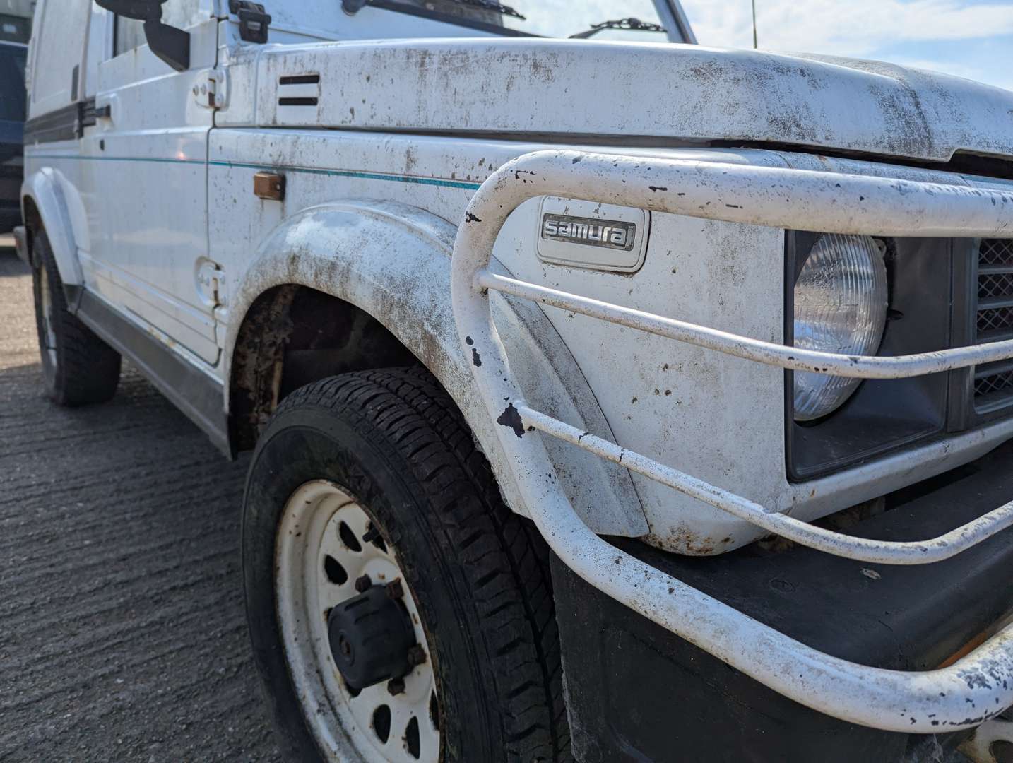 <p>1993 SUZUKI SAMURAI SPORT</p>