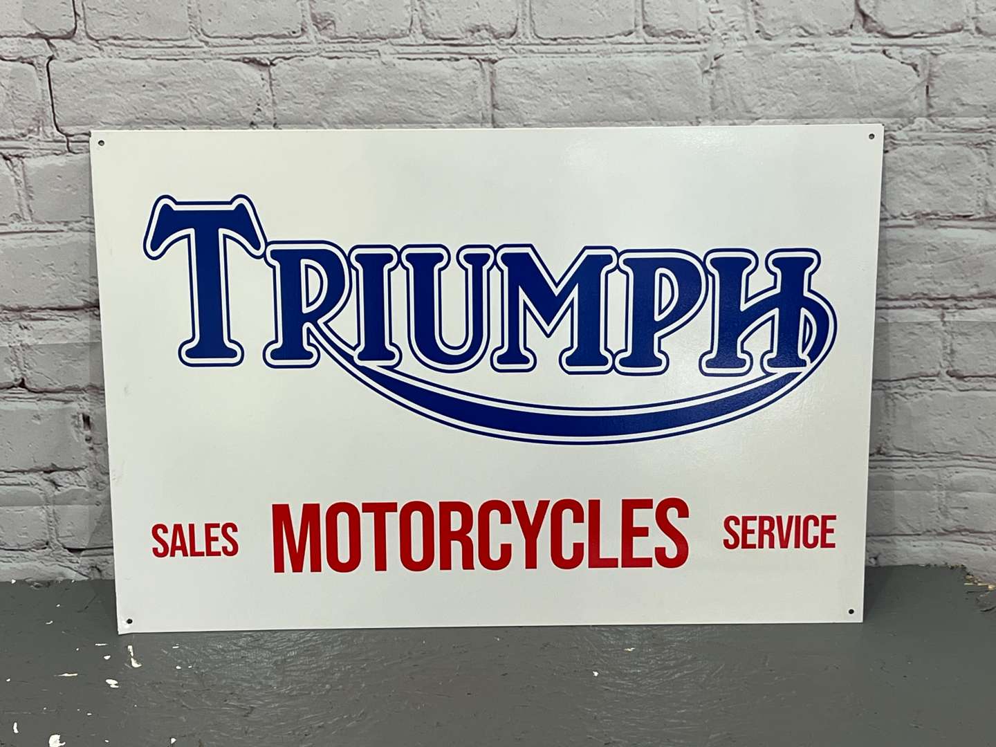 <p>Triumph Motorcycles Sales & Service Metal Sign&nbsp;</p>