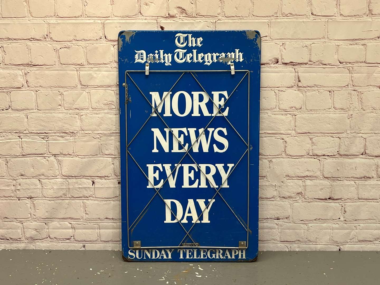 <p>The Daily Telegraph Metal Newspaper Board</p>