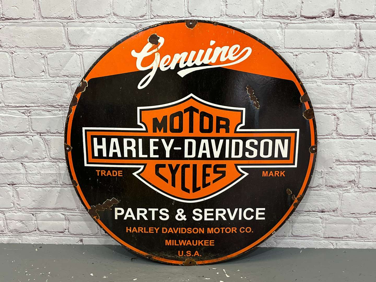 <p>Harley-Davidson Motorcycles Parts & Service Circular Enamel Sign</p>