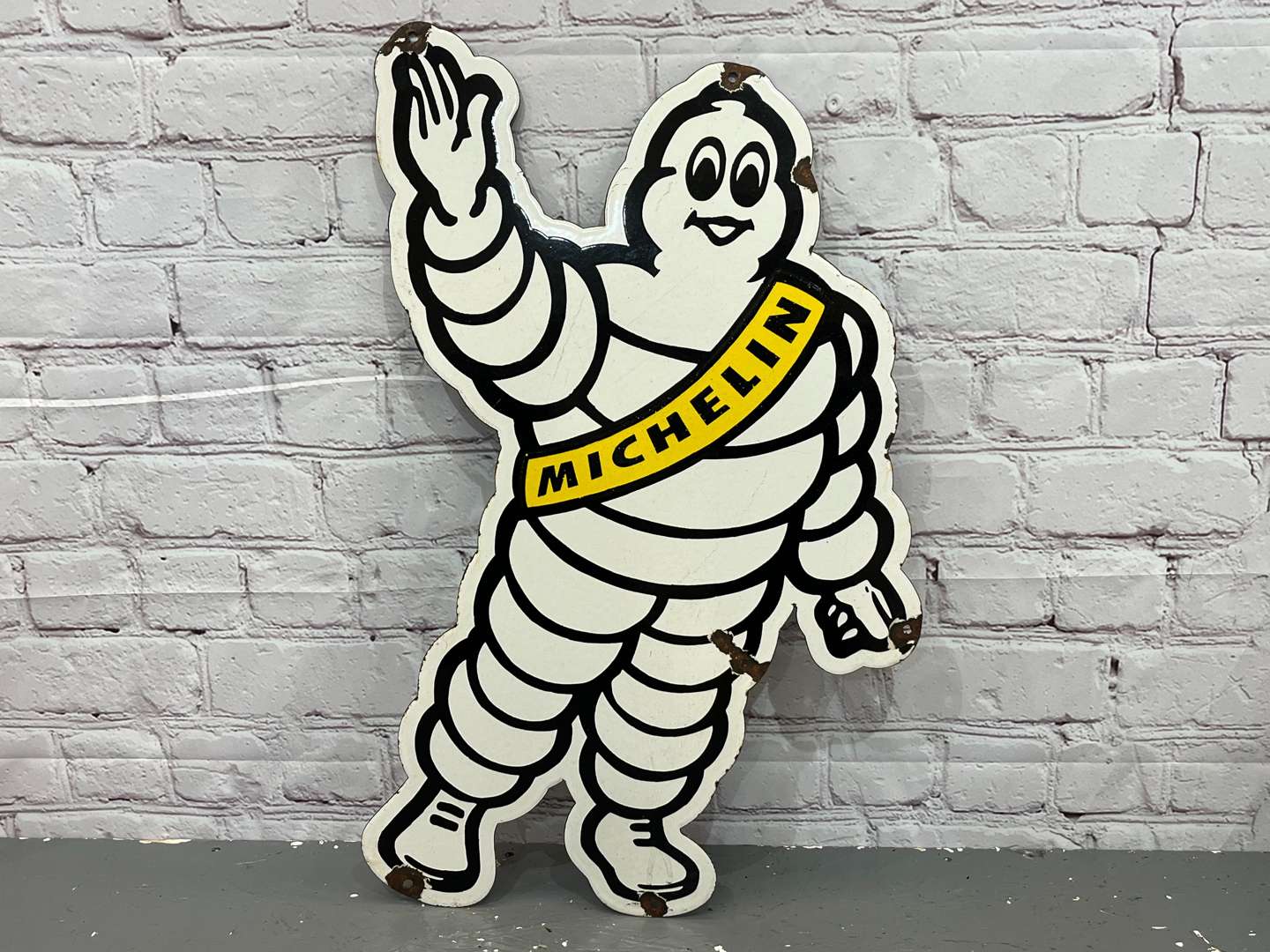 <p>Michelin Man With Sash Enamel Sign</p>
