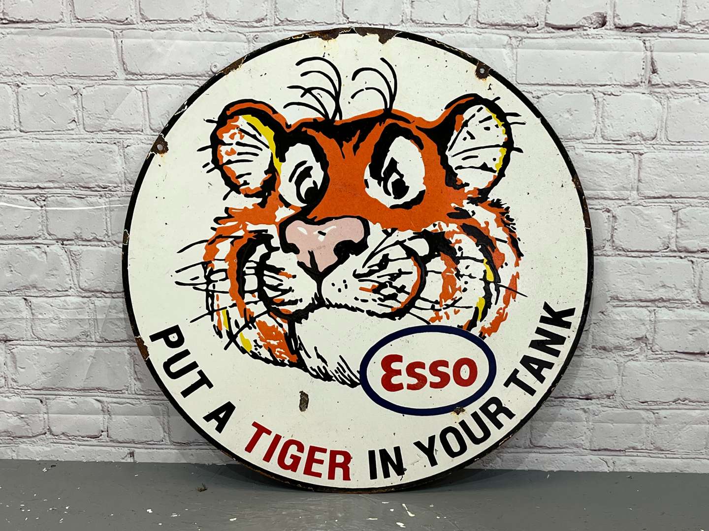 <p>Esso Put A Tiger In Your Tank Circular Enamel Sign</p>