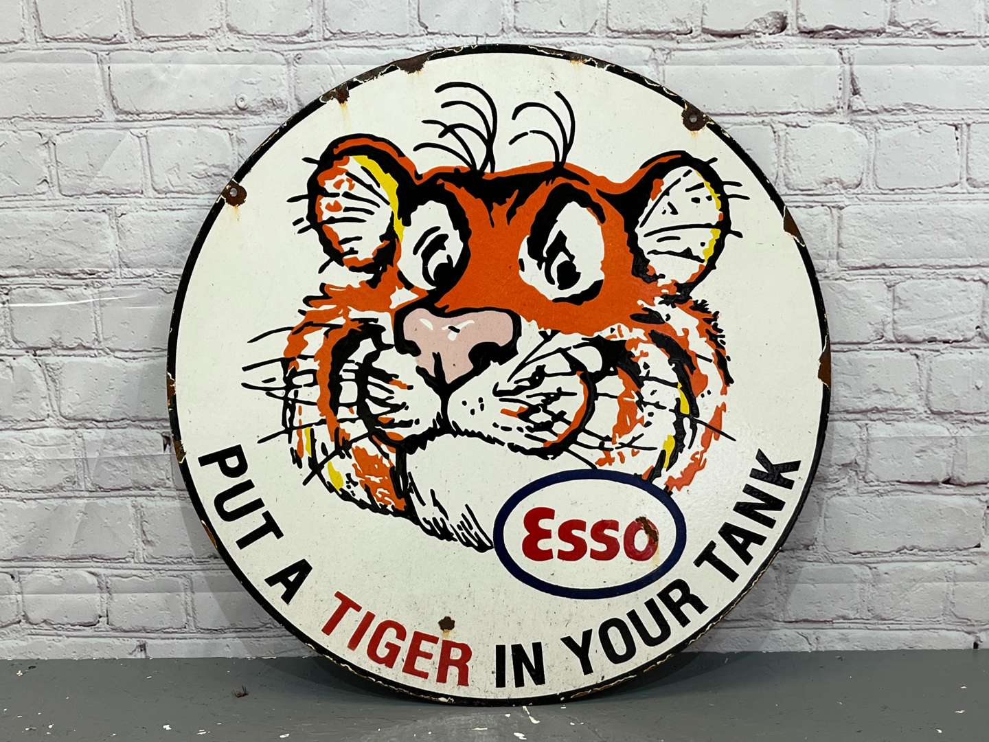 <p>Esso Put A Tiger In Your Tank Circular Enamel Sign</p>