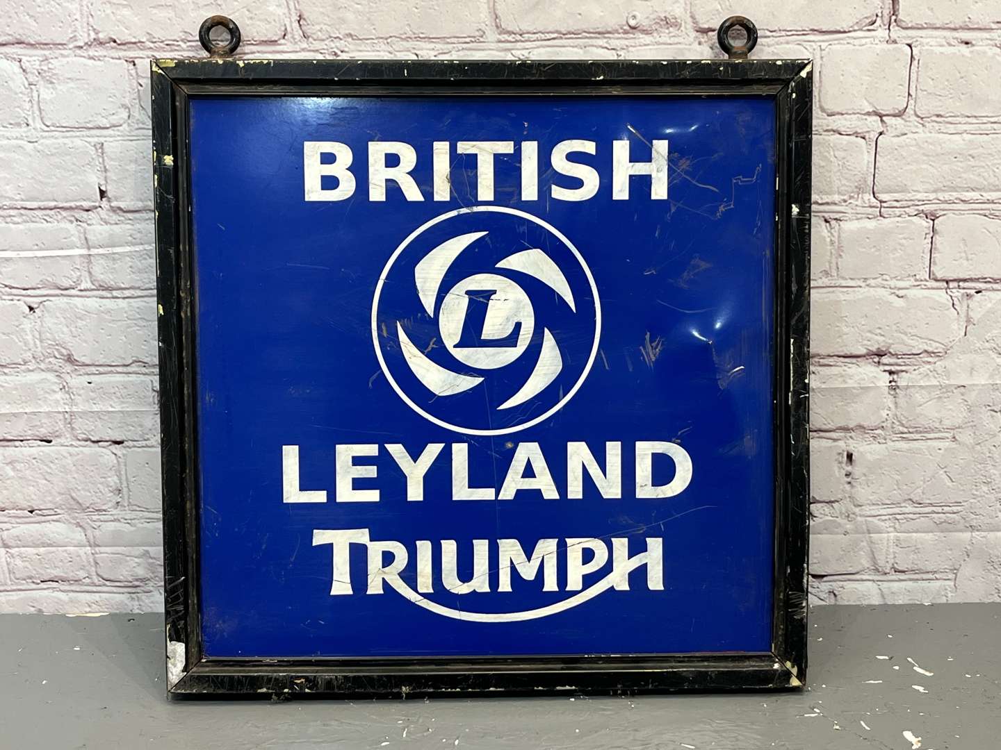 <p>British Leyland Triumph Framed Hanging Sign</p>