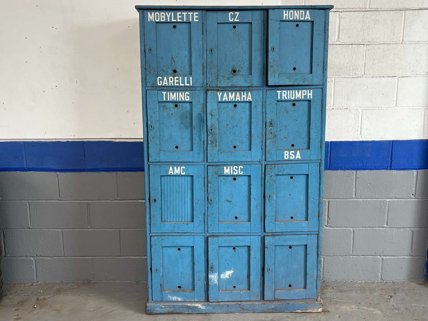 <p>Wooden Made Twelve Door Motorbike Parts Storage Cupboard</p>