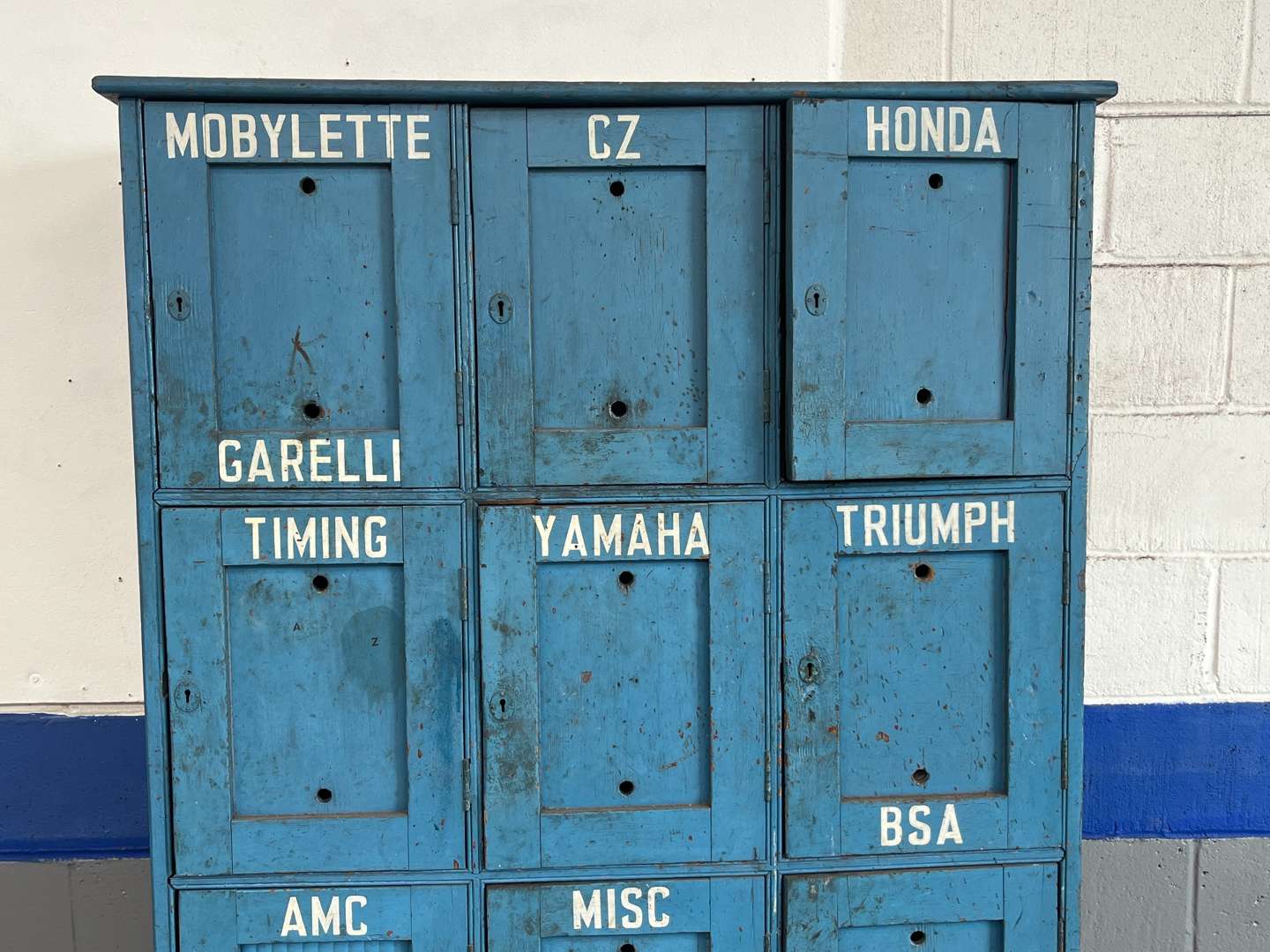 <p>Wooden Made Twelve Door Motorbike Parts Storage Cupboard</p>