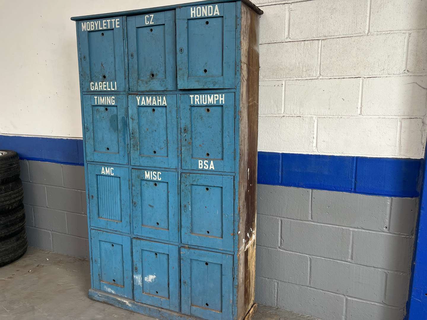 <p>Wooden Made Twelve Door Motorbike Parts Storage Cupboard</p>