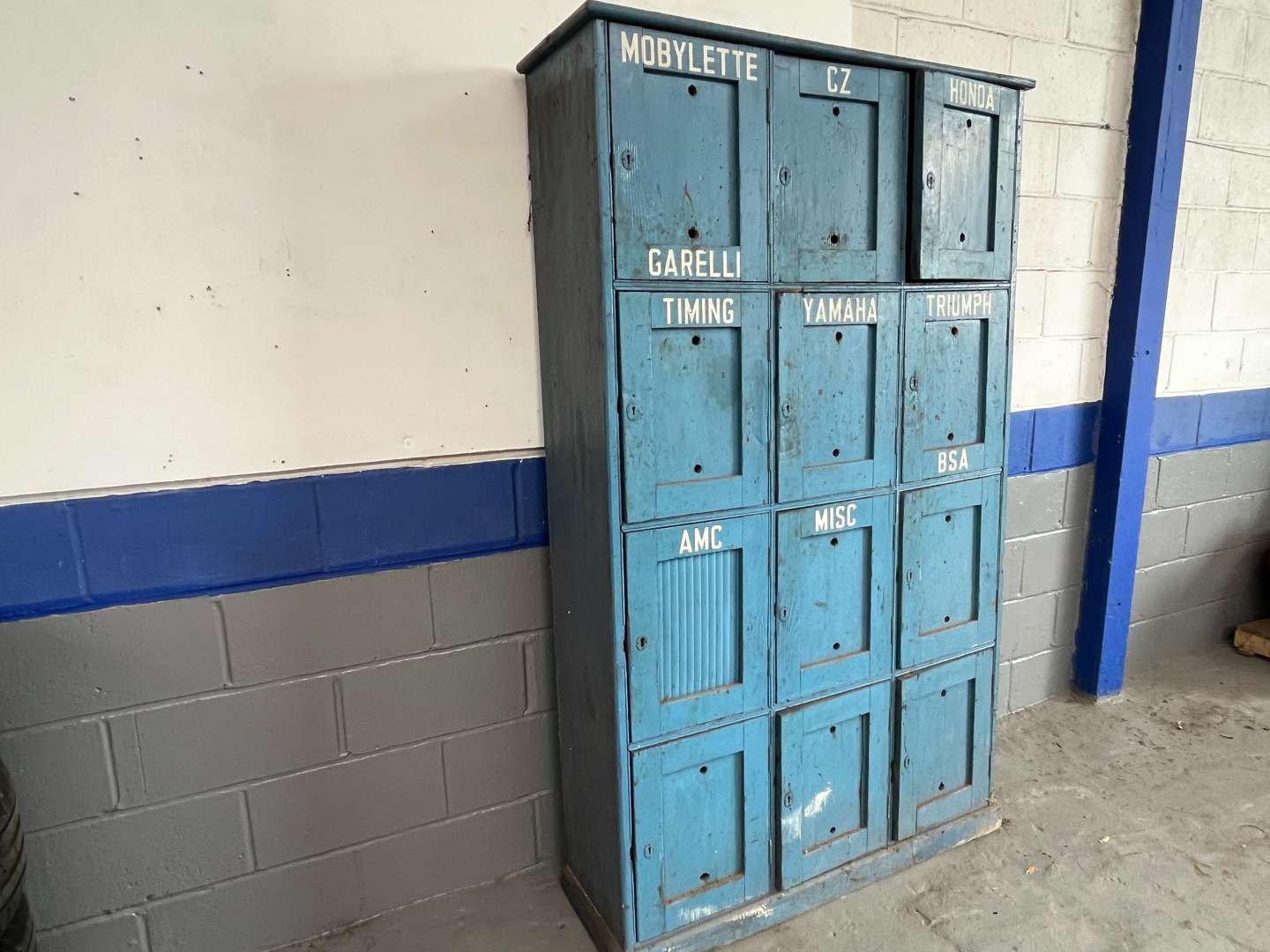 <p>Wooden Made Twelve Door Motorbike Parts Storage Cupboard</p>