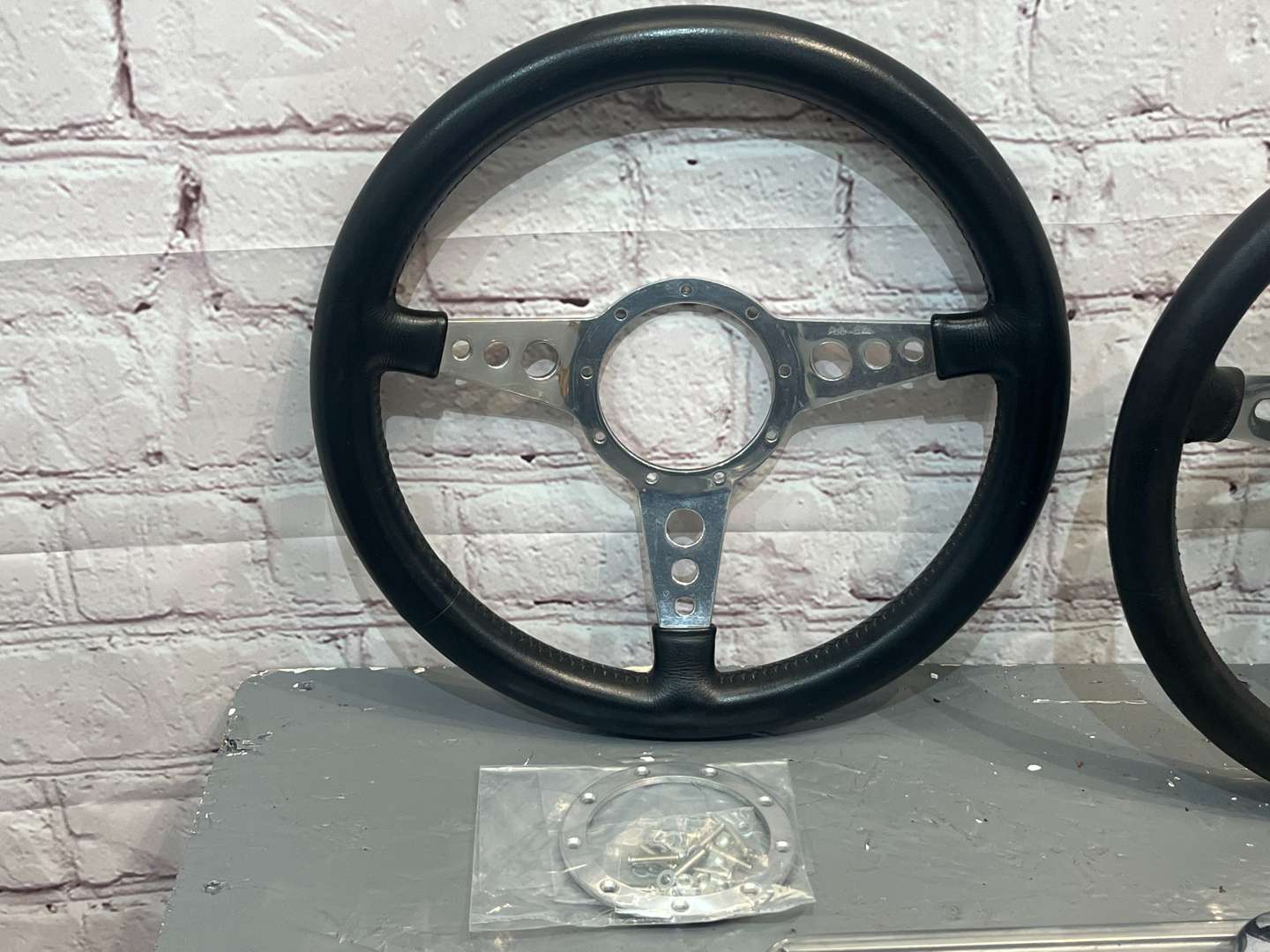 <p>Two Classic Car Steering Wheels , Mini/MG Rocker Cover</p>