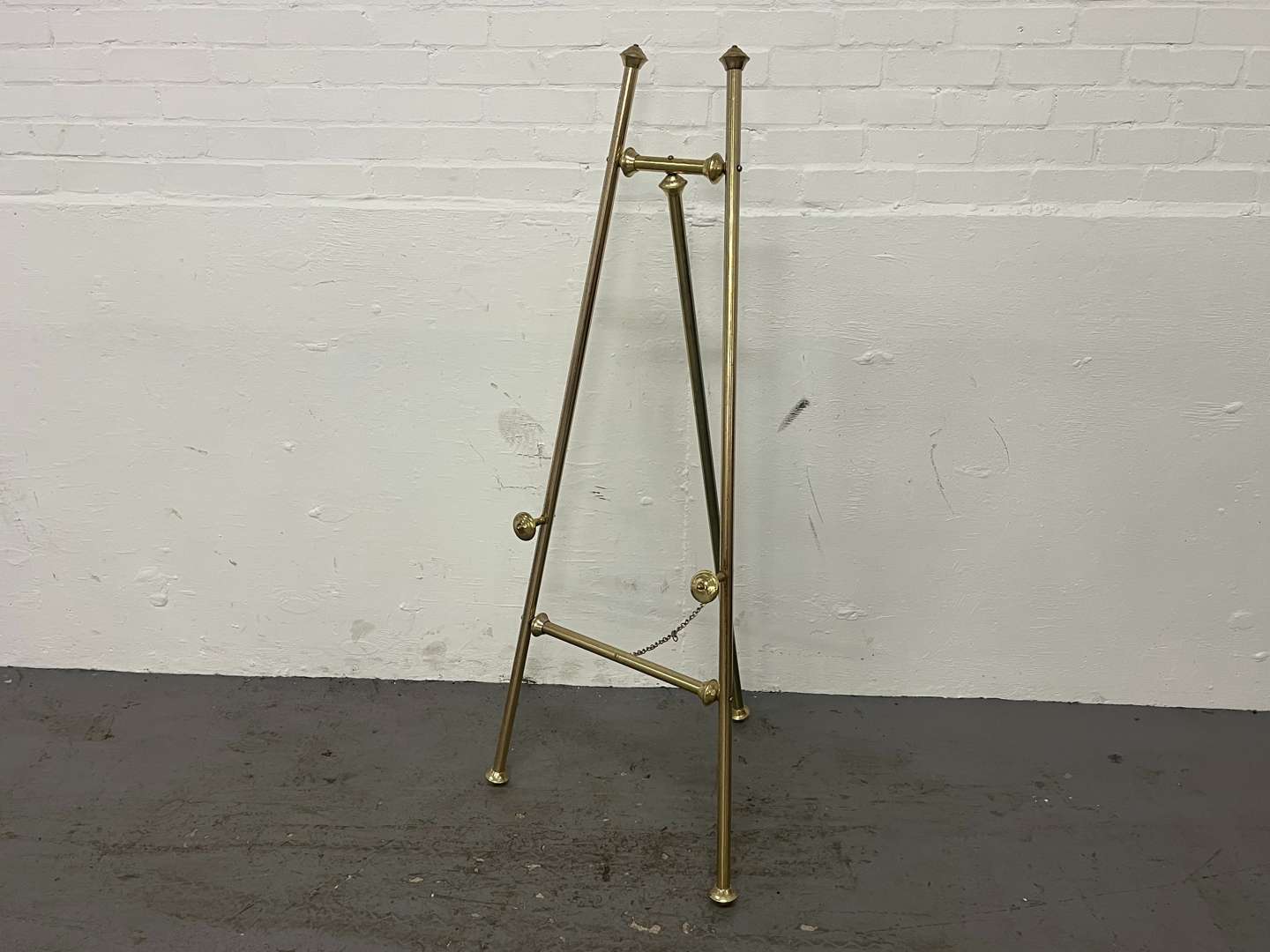 <p>Four Brass Effect Easels&nbsp;</p>