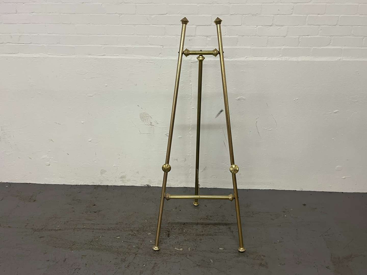 <p>Four Brass Effect Easels&nbsp;</p>