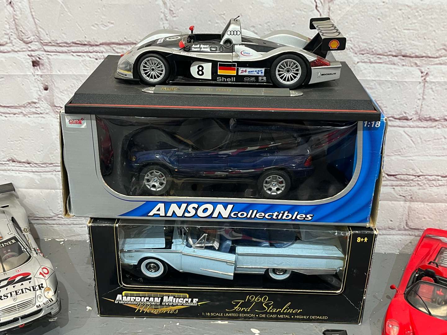 <p>Twelve 1:18 Scale Model Cars</p>