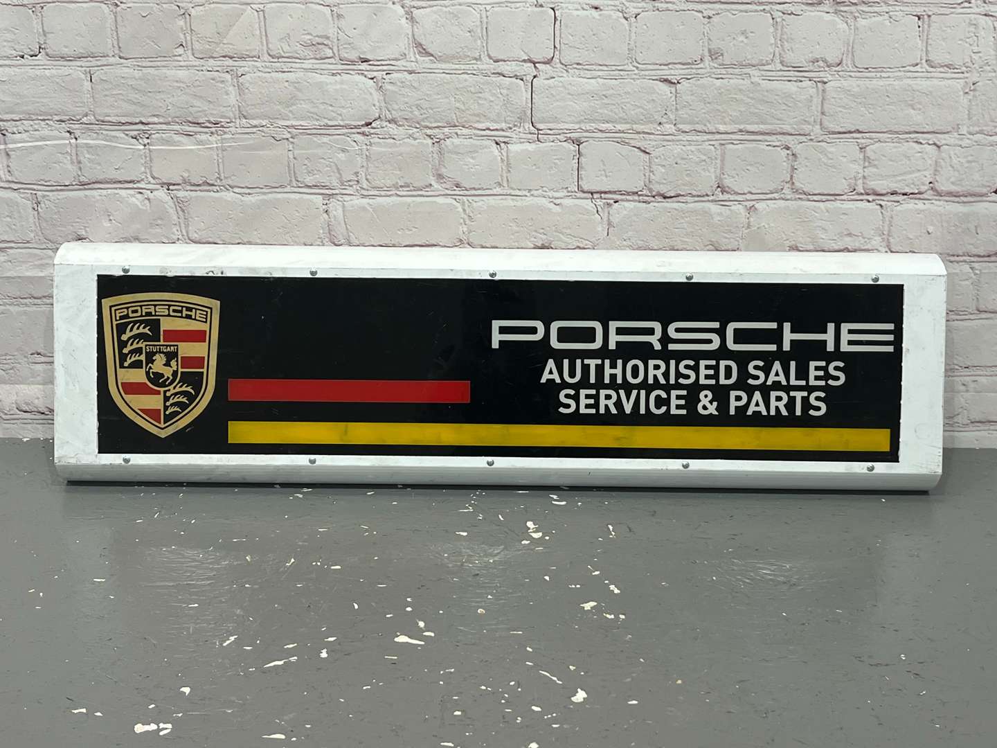 <p>Porsche Authorised Service & Sales Illuminated Sign</p>