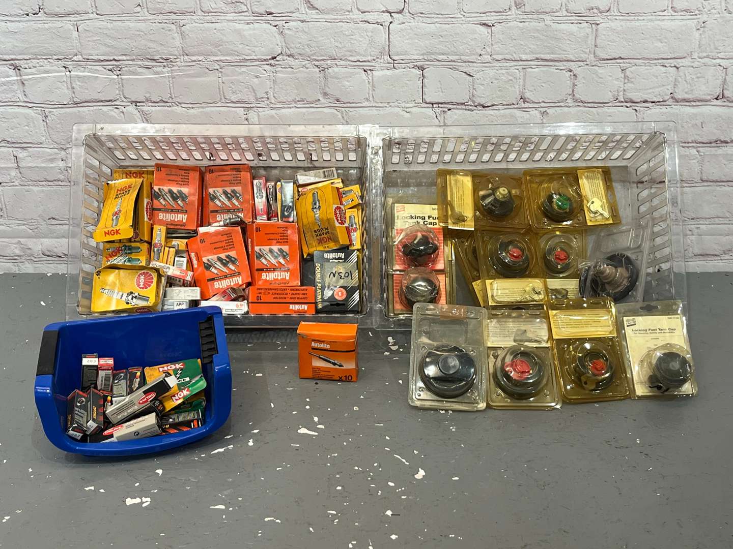 <p>Two Boxes Spark Plugs, Petrol Caps Etc</p>