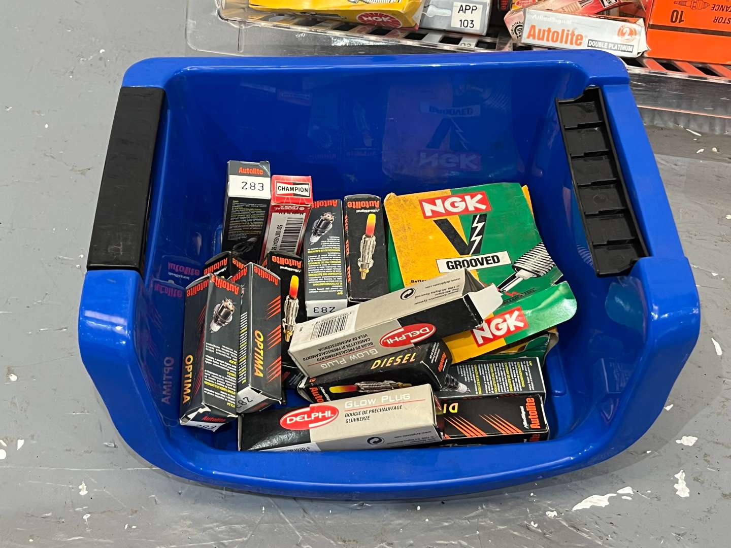 <p>Two Boxes Spark Plugs, Petrol Caps Etc</p>