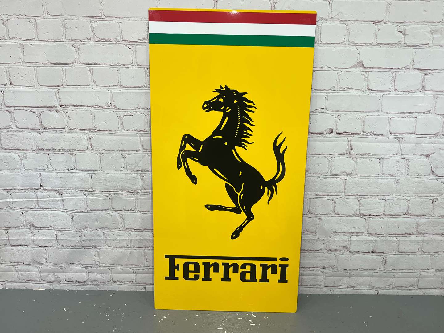 <p>Ferrari Sign on Metal Board&nbsp;</p>