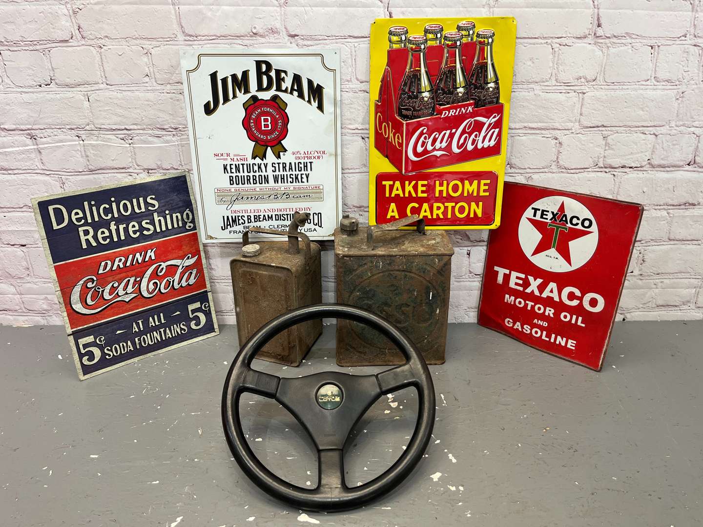 <p>Lotus Steering Wheel, Four Reproduction Tin Signs Etc</p>