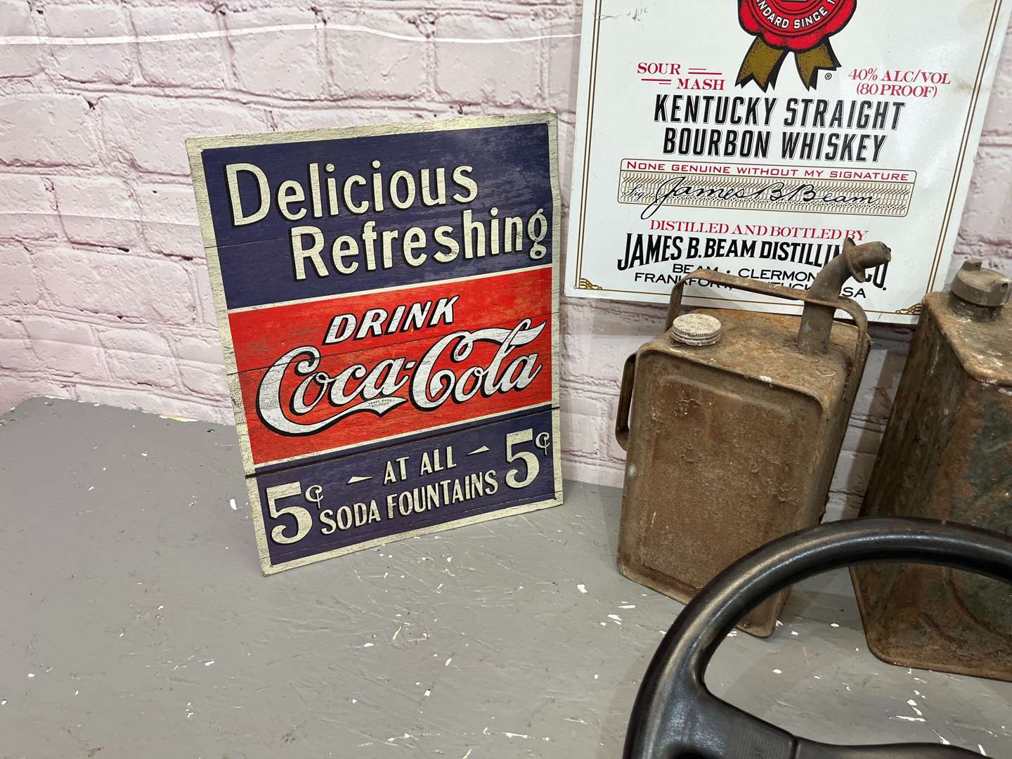 <p>Lotus Steering Wheel, Four Reproduction Tin Signs Etc</p>