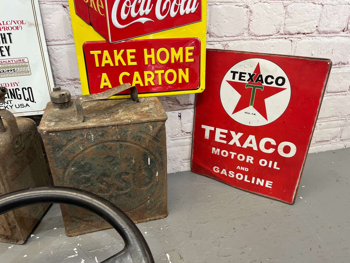 <p>Lotus Steering Wheel, Four Reproduction Tin Signs Etc</p>