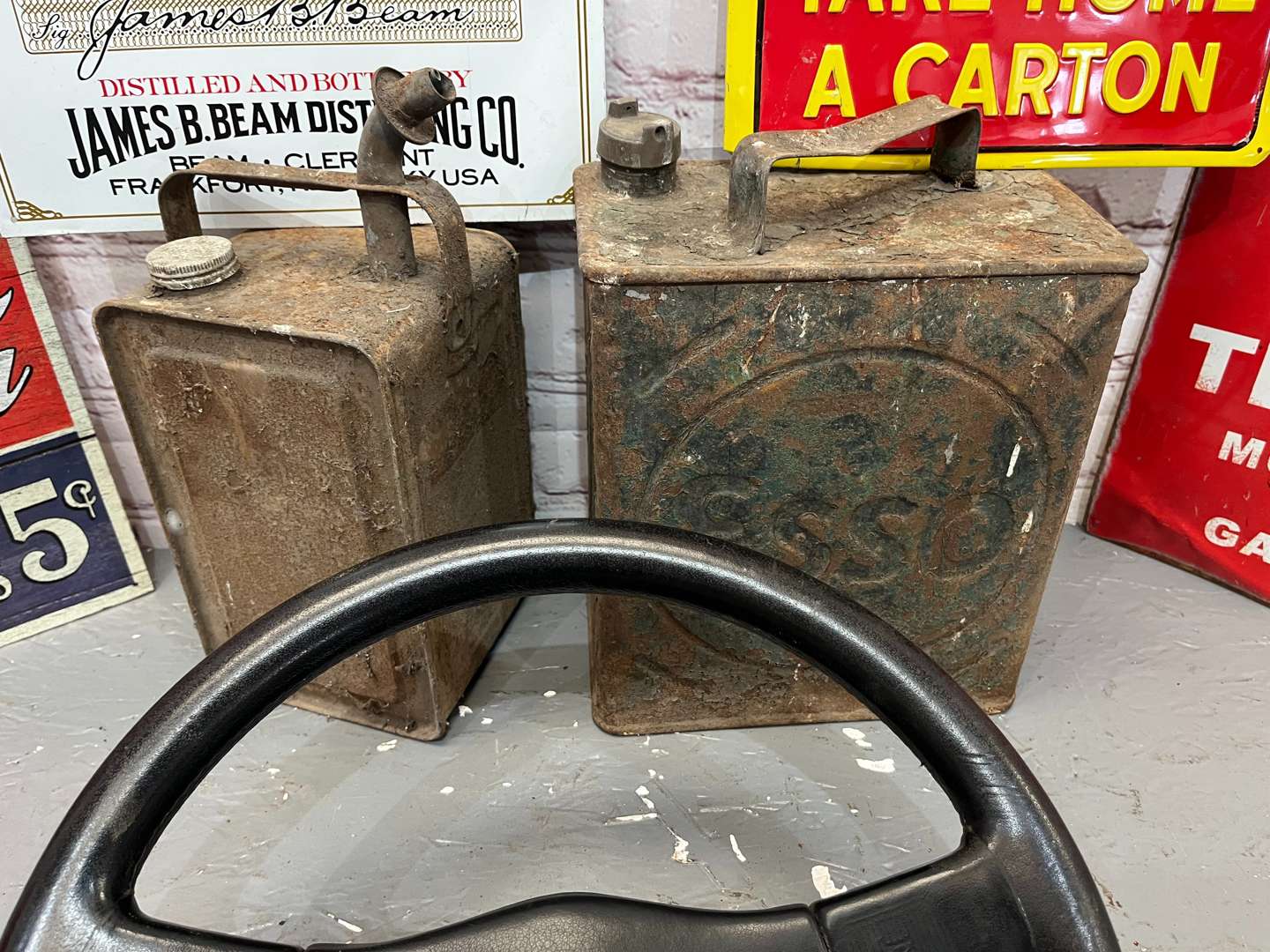 <p>Lotus Steering Wheel, Four Reproduction Tin Signs Etc</p>