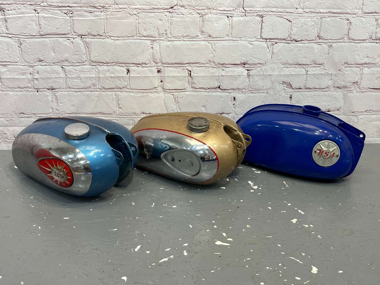 <p>Three BSA Motorbike Fuel Tanks</p>