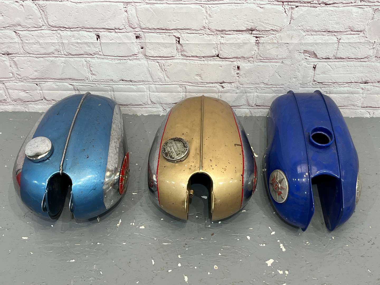 <p>Three BSA Motorbike Fuel Tanks</p>