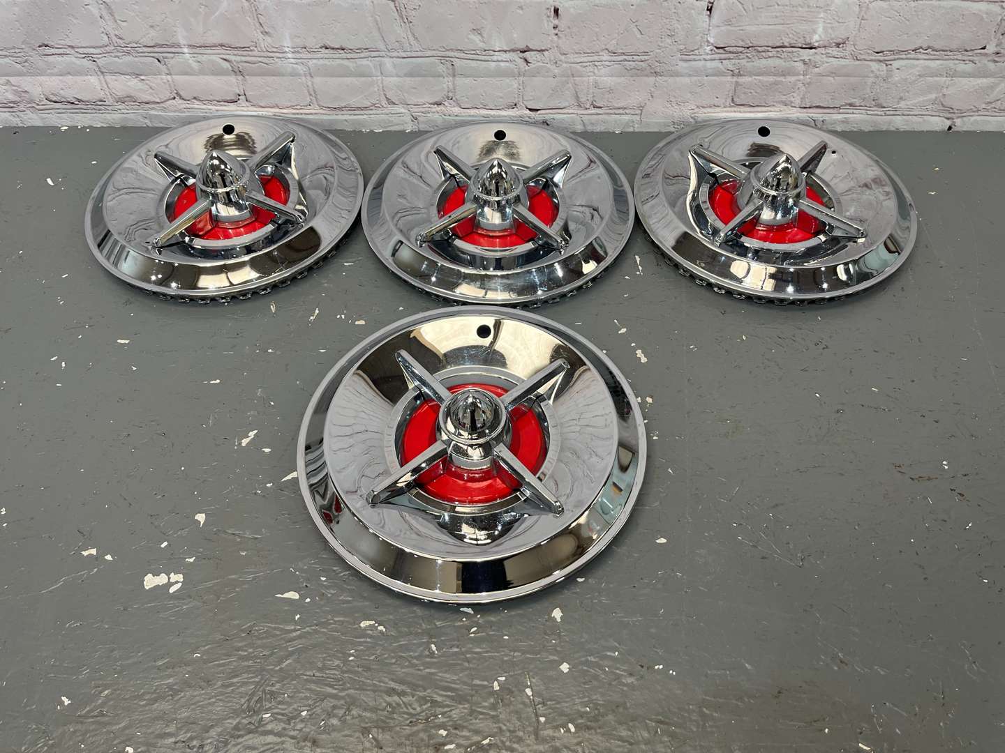 <p>Four American Hub Caps&nbsp;</p>