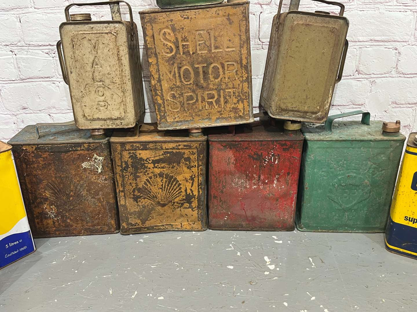 <p>Quantity of Two Gallon Fuel Cans, Oil Cans Etc</p>