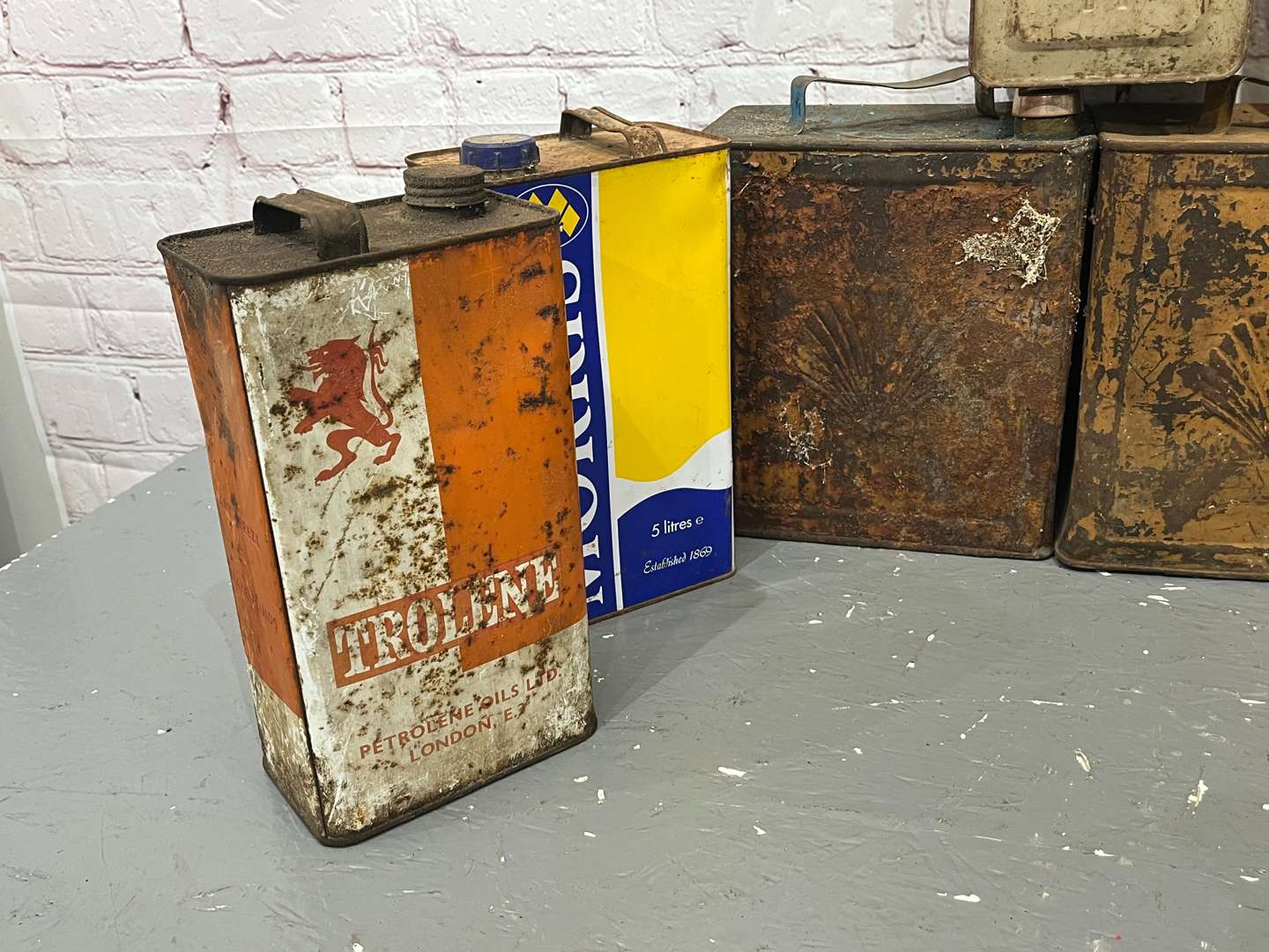 <p>Quantity of Two Gallon Fuel Cans, Oil Cans Etc</p>