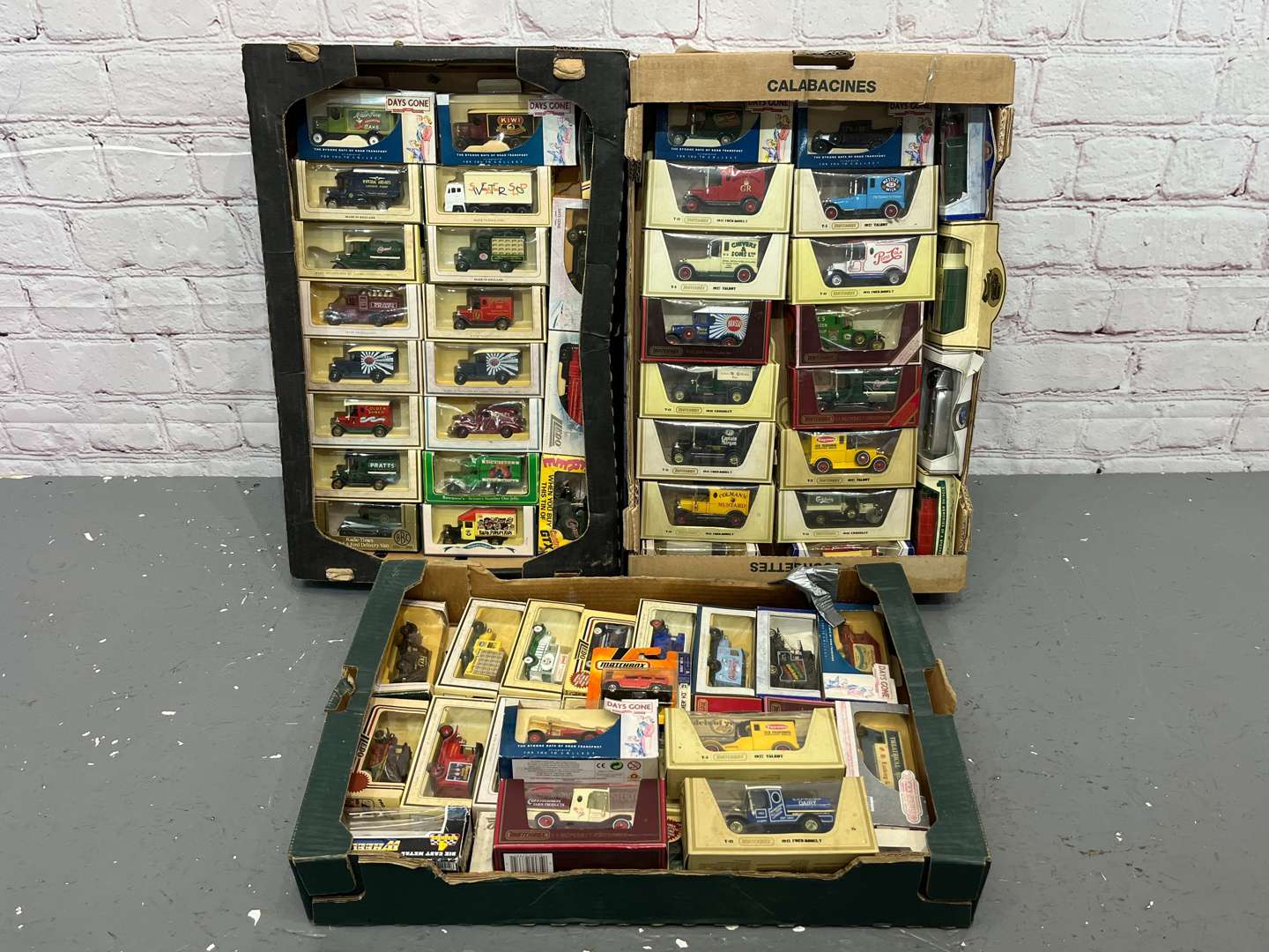 <p>Three Boxes Of Model Cars</p>