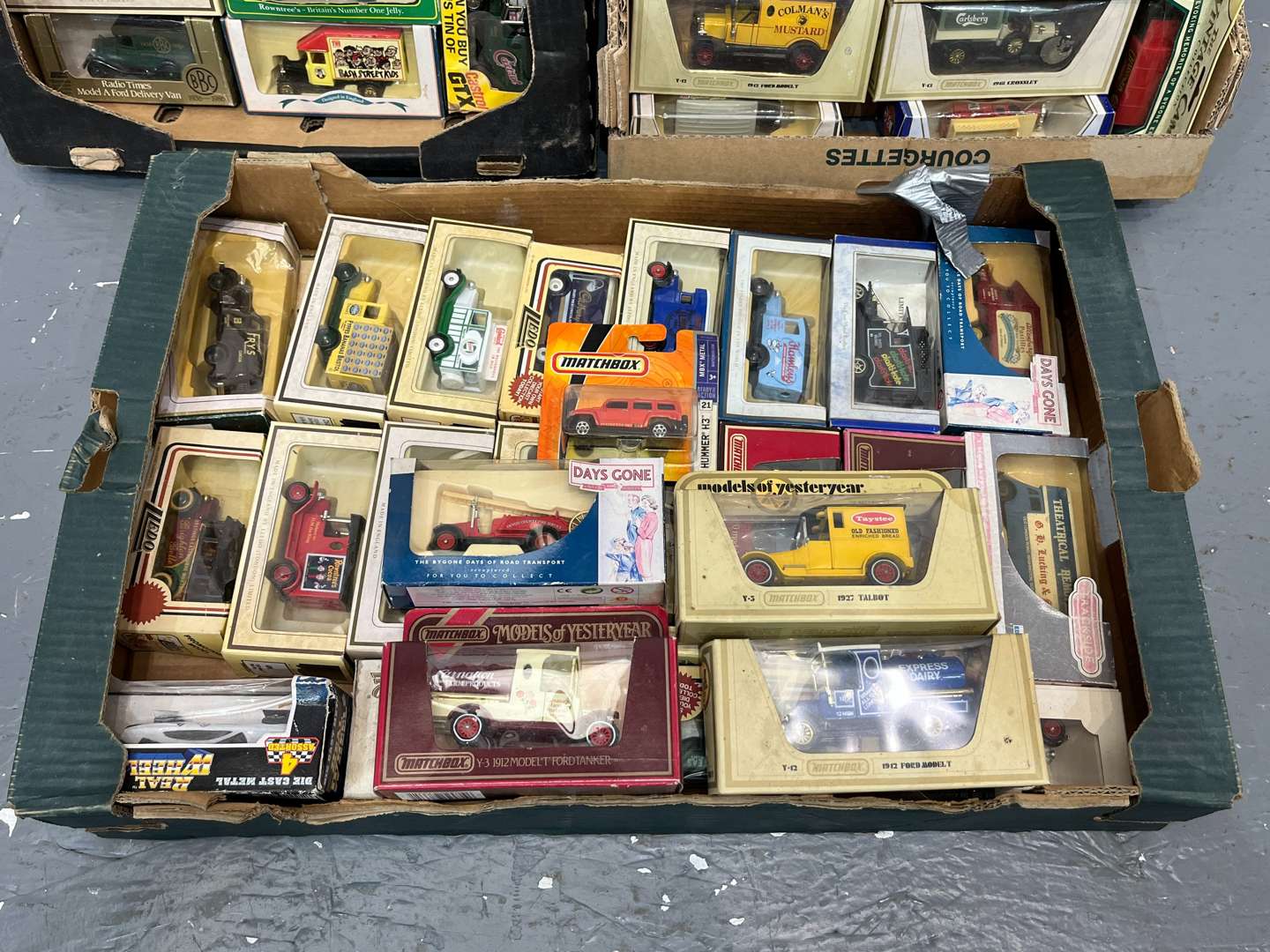 <p>Three Boxes Of Model Cars</p>