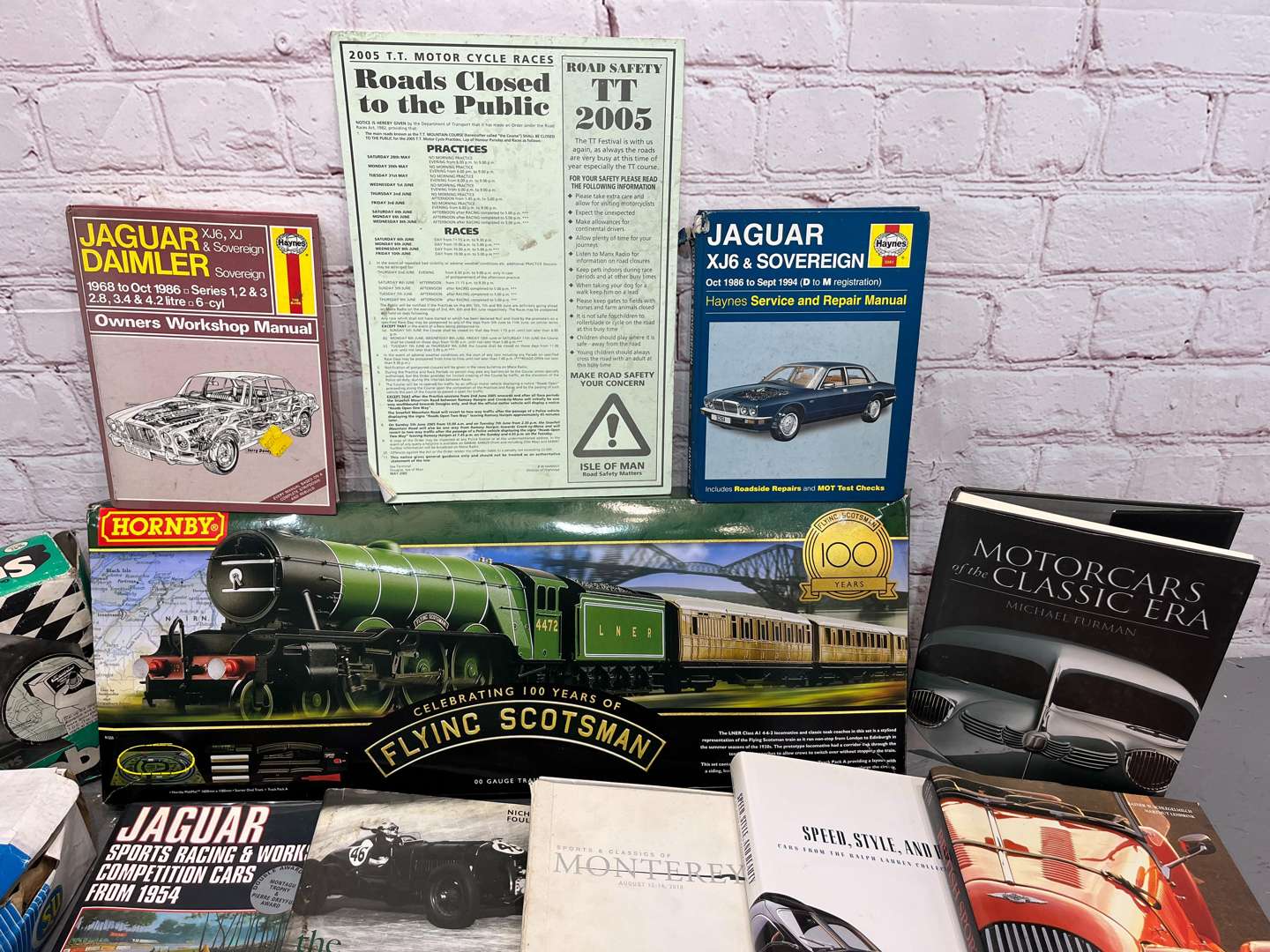 <p>Hornby Flying Scotsman, Castrol Stickers & Quantity of Motoring Books</p>